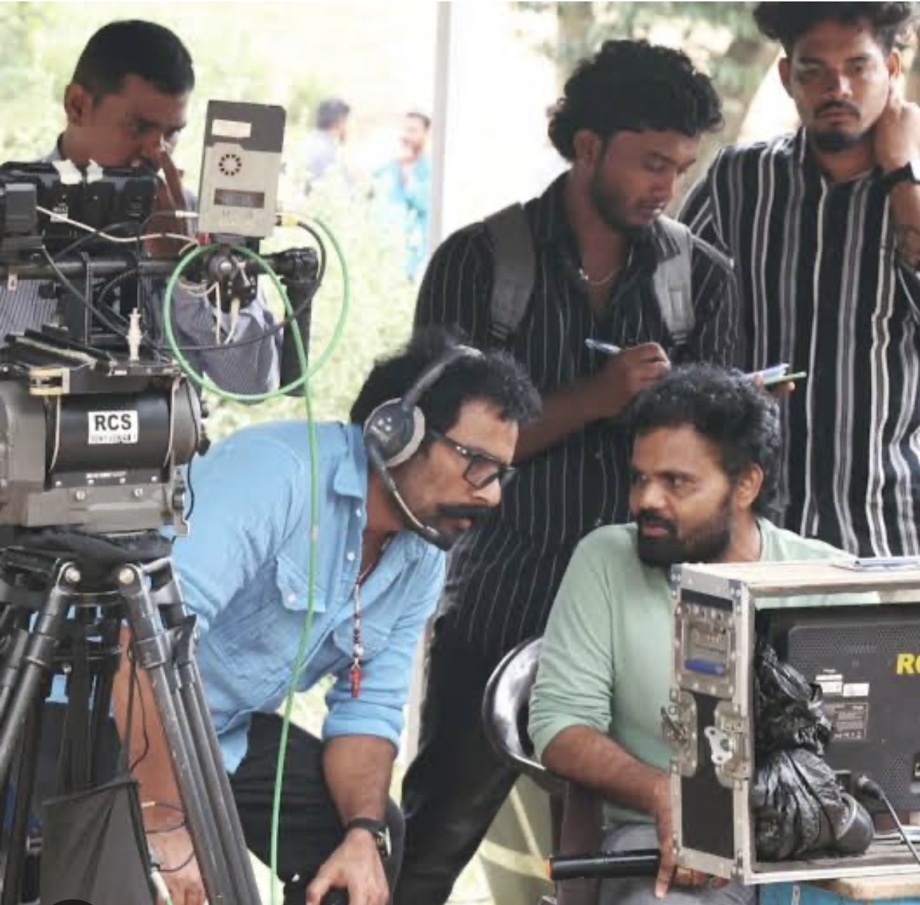 Properlymade crew reviewing a shot on the monitor during a location film shoot